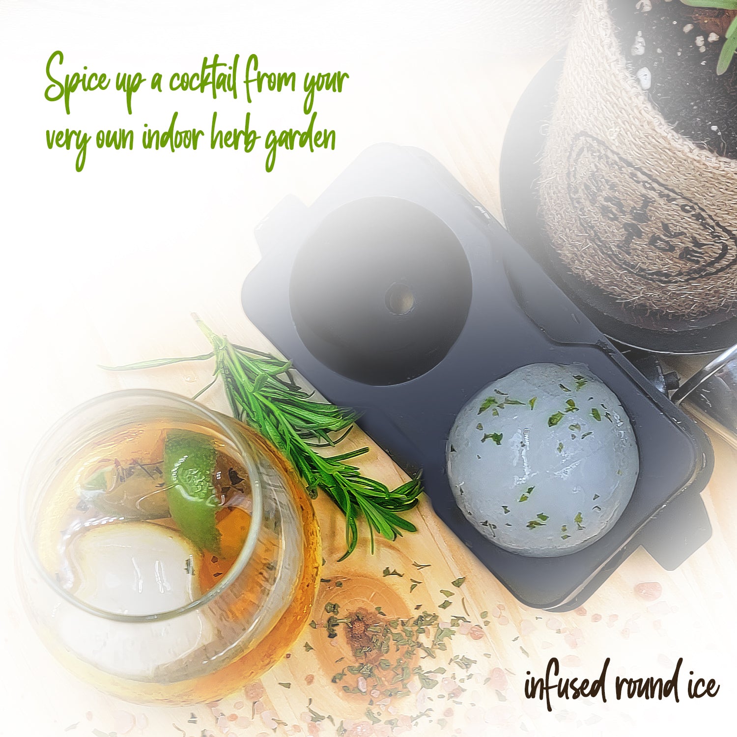 a cocktail made with fresh herbs from your new garden and ice balls made with the ice ball maker and infused with fresh herbs